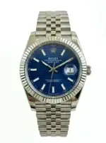 Rolex Datejust with blue dial and silver bracelet, fluted bezel, date window at 3 o'clock.