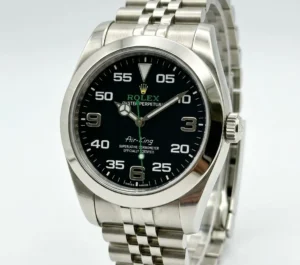 Rolex Air-King watch with black dial and stainless steel bracelet.