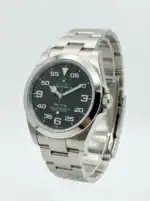 Rolex Air-King watch with black dial and stainless steel band.