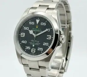 Rolex Air-King watch with black dial and stainless steel band.