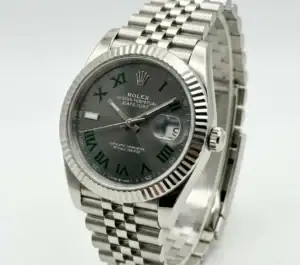 Rolex Datejust watch with Wimbledon green dial and silver Jubilee bracelet.