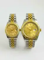 Two-tone Rolex Datejust watches for couple, gold and silver, with diamond markers.