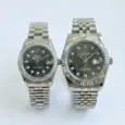 Silver Rolex Datejust couple watches with black dials and diamond markers.