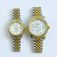 Pair of Rolex Datejust watches with gold and silver band and pearl dial.