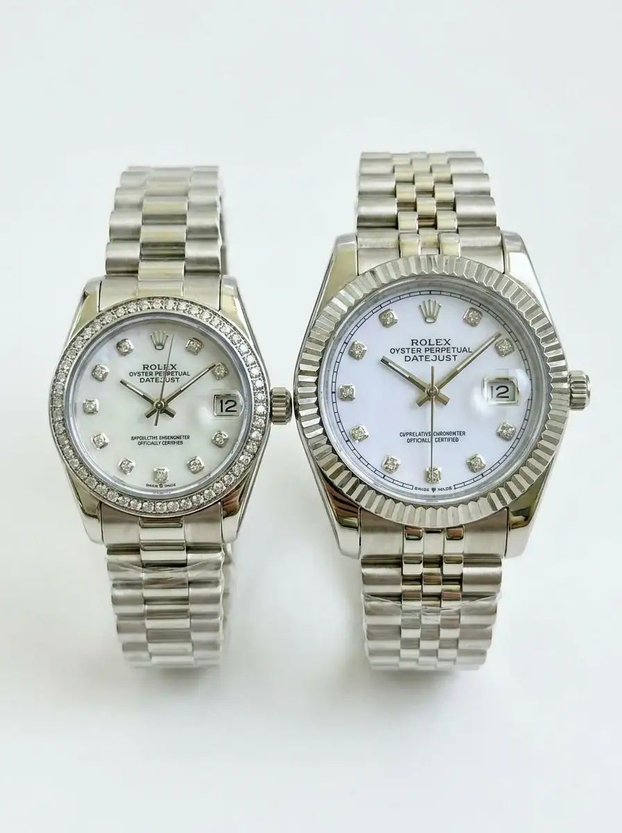 Rolex Datejust Silver White Couple Watch Set Pair of Rolex Datejust watches with silver bands and white dials, one with diamond hour markers.