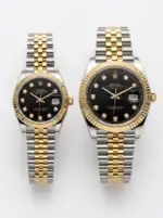 Pair of Rolex Datejust two-tone black dial watches with gold and silver bands.
