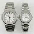 Pair of Patek Philippe Nautilus watches in silver with white dials.