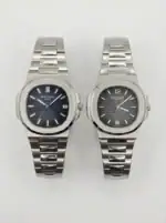 Pair of Patek Philippe Nautilus watches in silver with blue and black dials.