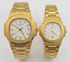 Gold Patek Philippe Nautilus couple watches with white dials and gold bracelets.