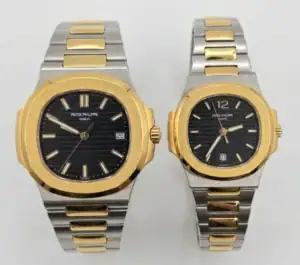 Two-tone Patek Philippe Nautilus couple watches with black dials and gold accents.