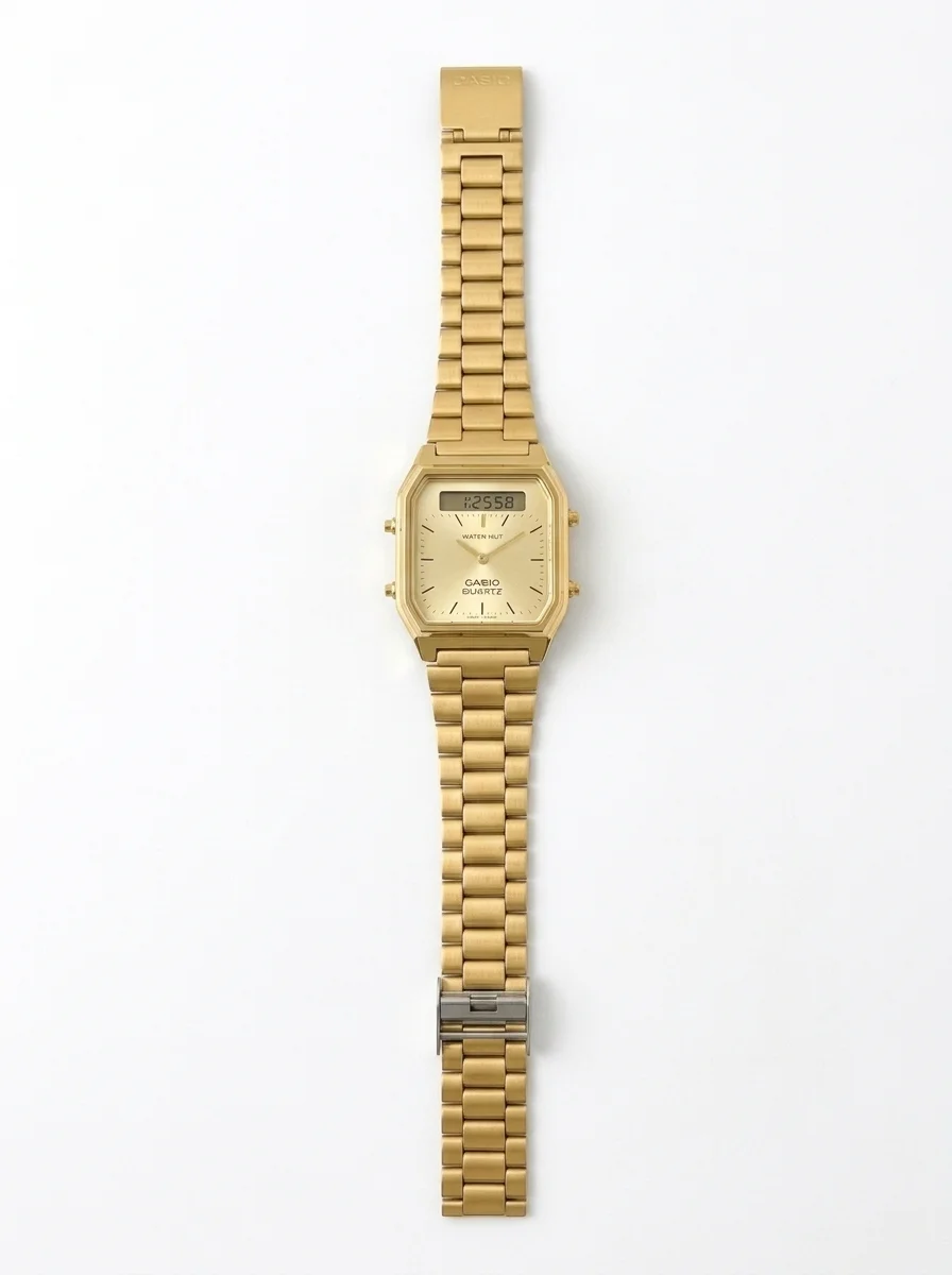 Isolate_gold-toned_watch_20261009005722 ساعة كاسيو كوارتز باللون الذهبي الشامبانيا بشاشتين ومقاومة للماء - الصورة 1